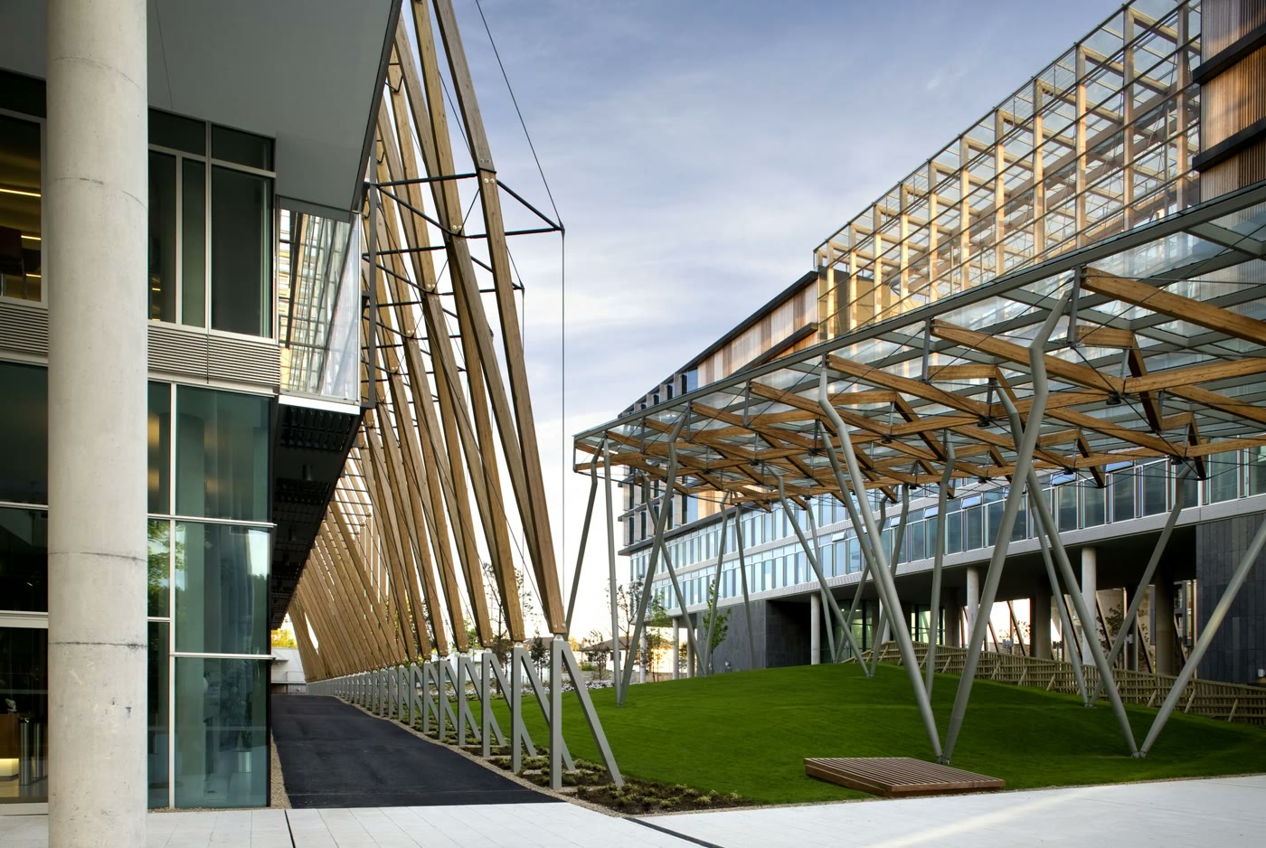 A lawned courtyard under the timber lattice