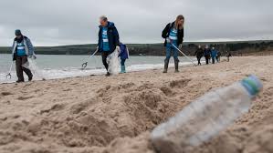 Members at a beach clean on the strand