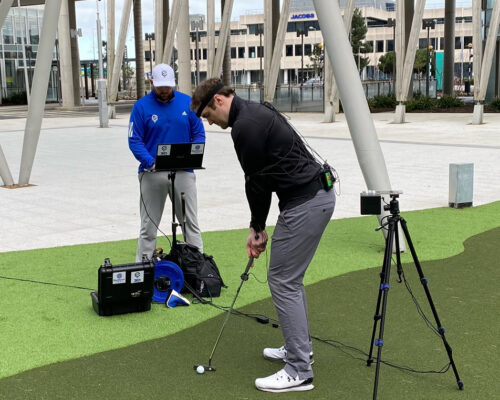 Members playing on the six-hole putting green